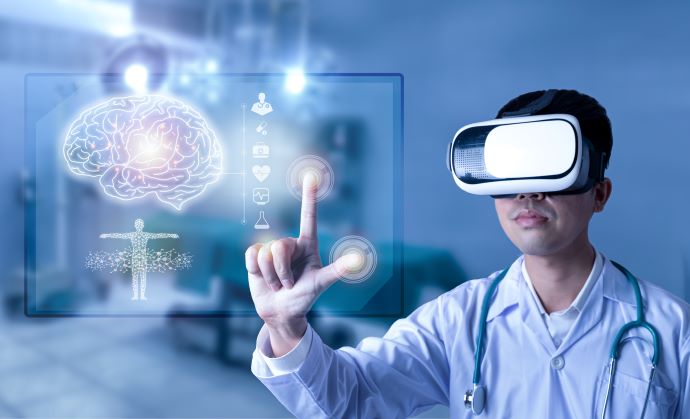 Doctor using a virtual reality headset to examine brain activity 
